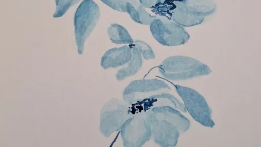 Watercolor painting of blue flowers and leaves.